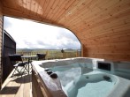 Open fronted, housed hot tub with wonderful views