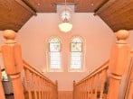 The old chapel stained glass windows still feature throughout The old chapel stained glass windows still feature throughout