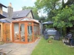 A wonderful garden ideal for al fresco dining while dipping in and out of the hot tub A wonderful garden ideal for al fresco dining while dipping in and out of the hot tub