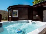 Relax in the hot tub with stunning views