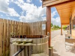 Relax in the private wood-fired hot tub