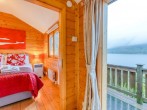 Step inside the double bedroom with amazing Loch Earn views