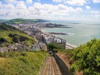 Enjoy a day in Aberystwyth with its Victorian promenade, pier and sandy beach