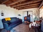 A cosy couch and sheepskins