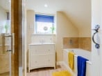 Bathroom with bath and separate shower