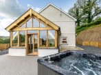 The stunning oak framed conservatory with your very own private hot tub