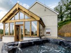 Venture outside to your very own hot tub with views of the countryside
