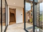 A glass corridor which leads you to all the areas of the ground floor A glass corridor which leads you to all the areas of the ground floor