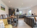 Open-plan living where you can relax, cook and dine Open-plan living where you can relax, cook and dine