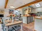 Bright and spacious open-plan living area with views over the river Bright and spacious open-plan living area with views over the river
