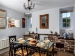 The dining room with original flagstone floor The dining room with original flagstone floor