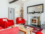 The large living room has a wood fired stove, perfect for autumn and winter getaways The large living room has a wood fired stove, perfect for autumn and winter getaways