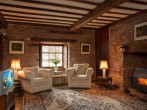 The oak panelled sitting room