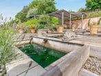 The stunning communal gardens offer far-reaching views and the sound of running water The stunning communal gardens offer far-reaching views and the sound of running water