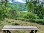 A picnic bench with a view lies in walking distance of the property