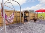 Garden with hammock, fire pit, BBQ and table overlooking the fields Garden with hammock, fire pit, BBQ and table overlooking the fields