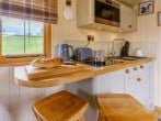 Kitchen area with hob, convection oven and microwave Kitchen area with hob, convection oven and microwave