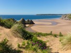 Take a trip to Three Cliffs Bay with its wonderful views and meandering river
