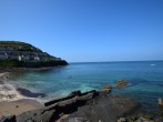 Visit New Quay with its lovely beaches and you may just spot a dolphin or two