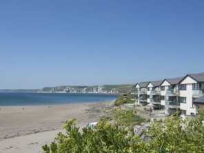 Top Floor Apartment overlooking a Sandy Beach