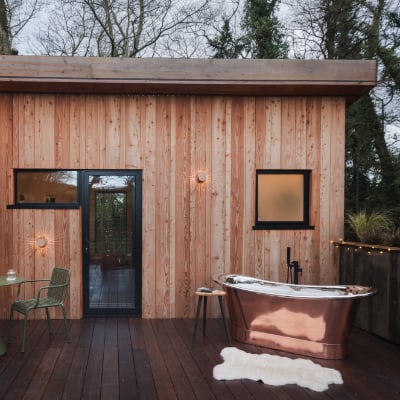 Copper bath on the treehouse deck