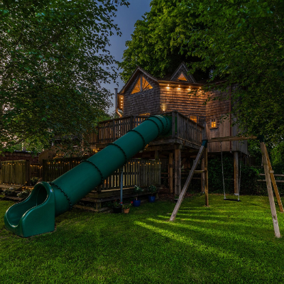 Octagonal treehouse with slide in Somerset