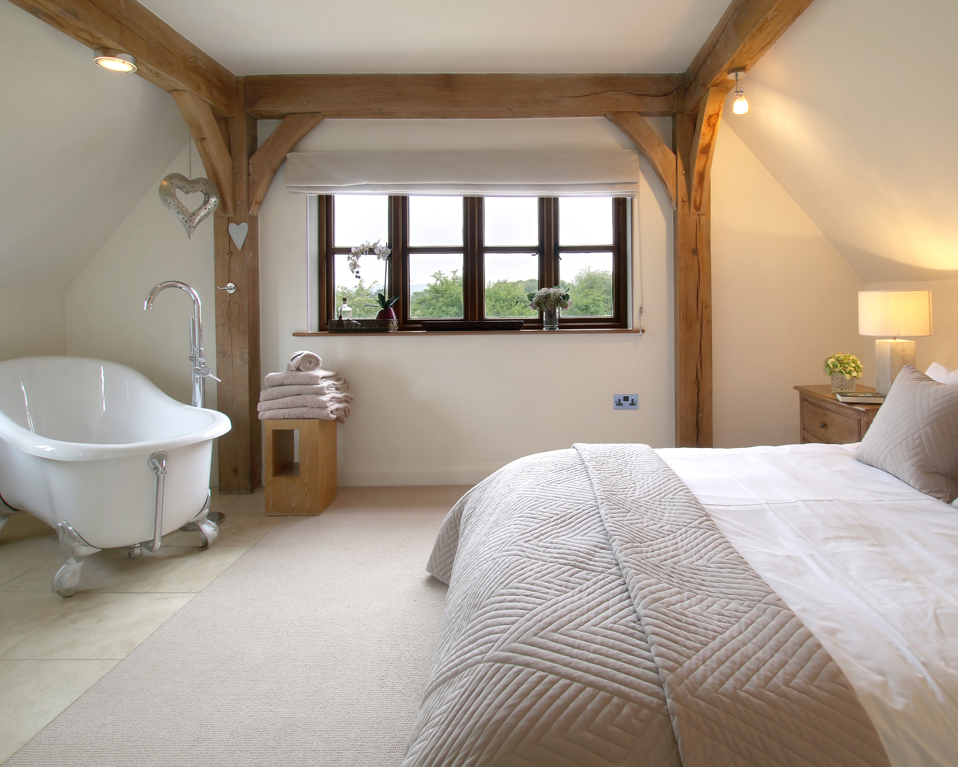 Bedroom with freestanding bath
